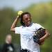 Lincoln sophomore Lauryn Hood throws a ball toward the infield while holding her glove during practice on Tuesday, May 7. Daniel Brenner I AnnArbor.com
